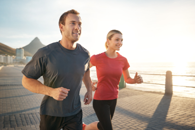 A DPC healthy man and woman running